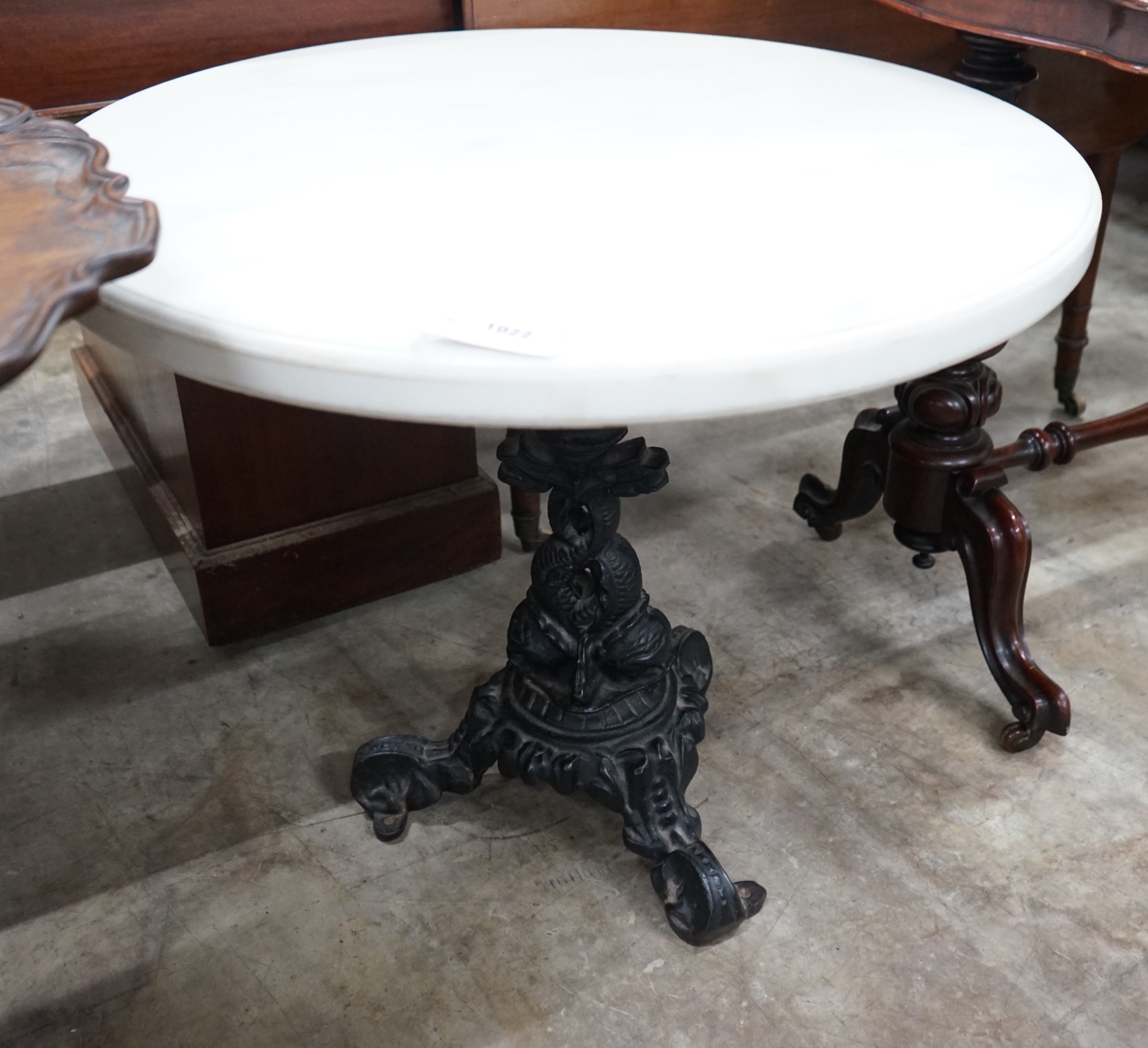 A Victorian style circular cast iron and reconstituted marble top occasional table, diameter 75cm, height 84cm